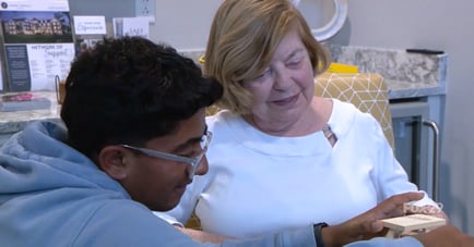 a young volunteer with senior lady 